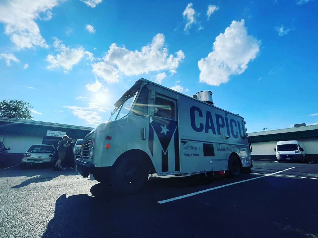 A vibrant food truck on a sunny day
